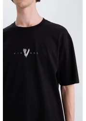 Defacto تي شيرت 100% قطن الفايكنج فالهالا بوكسي بياقة دائرية وطباعة خلفية وأكمام قصيرة E3277AX25SM