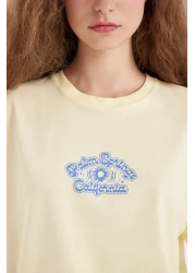 Defacto تي شيرت كبير الحجم بأكمام قصيرة ورقبة دائرية وطباعة خلفية D4929ax24au