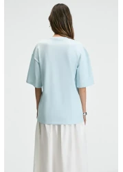 GRIMELANGE تي شيرت نسائي من NITZA مصنوع من القطن بنسبة 100% برقبة دائرية كبيرة الحجم باللون الأزرق