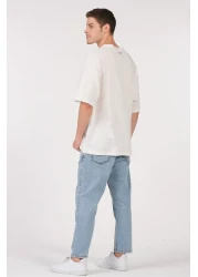 to COSMOS تي شيرت للجنسين (رجال - نساء) مقاس كبير (فضفاض-سلاش) لون إكرو (أبيض) لا تقدم أبدًا